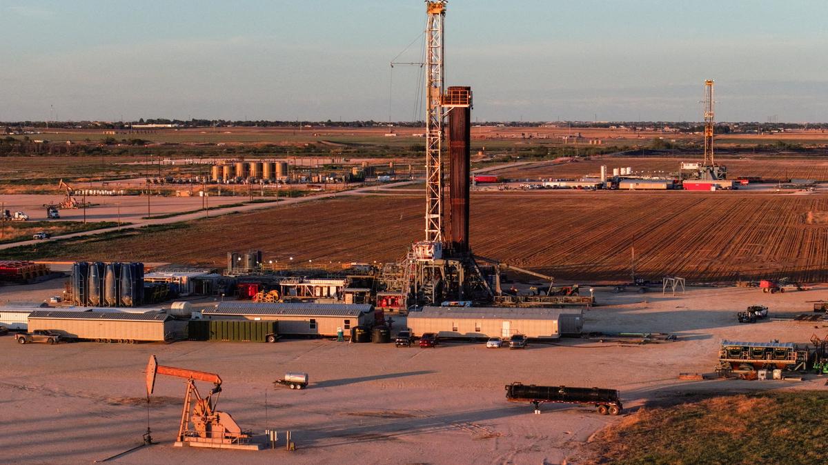 FILE PHOTO: A drone view of drilling rigs in Midland, Texas, U.S. June 11, 2025. REUTERS/Eli Hartman/File Photo