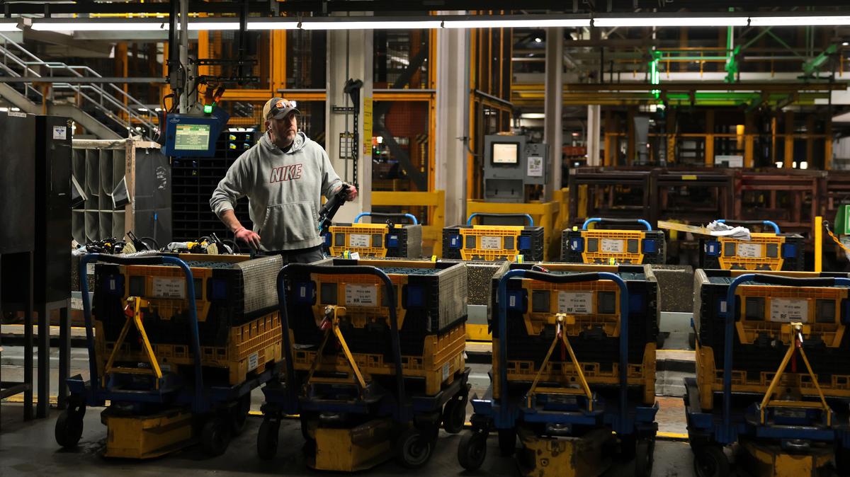 President Trump Tours Ford Rouge Complex In Michigan. DEARBORN, MICHIGAN - JANUARY 13: A worker helps assemble automobiles before U.S. President Donald Trump arrives at Ford River Rouge Complex on January 13, 2026 in Dearborn, Michigan. Trump is visiting Michigan where he will participate in a tour of the Ford River Rouge complex and later give remarks to the Detroit Economic Club. 