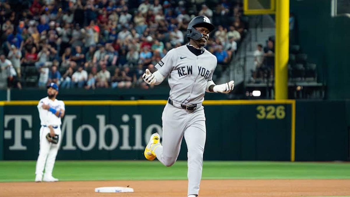  New York Yankees second baseman Jazz Chisholm Jr. (13) reacts as he runs the bases after hitting a solo home run against the Texas Rangers during the fourth inning at Globe Life Field. | Raymond Carlin III-Imagn Images 