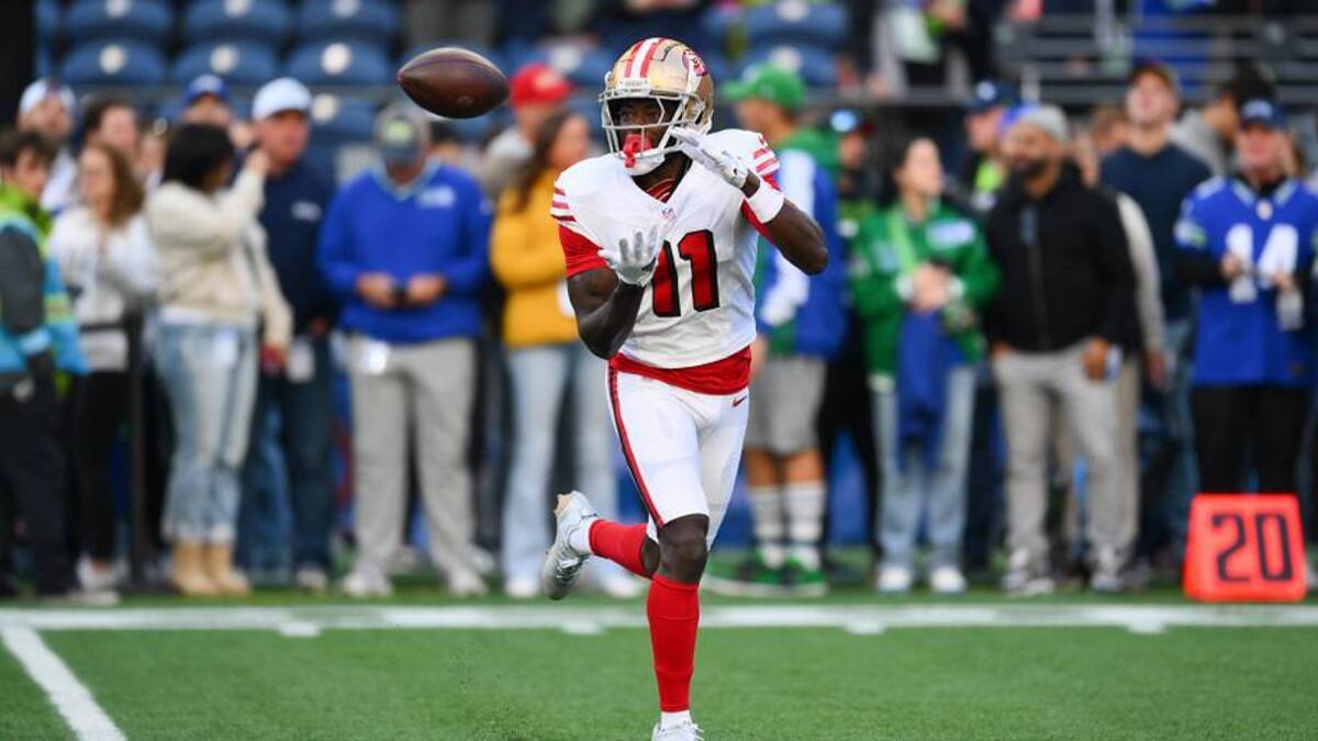  Oct 10, 2024; Seattle, Washington, USA; San Francisco 49ers wide receiver Brandon Aiyuk (11) catches the ball during warmups before the game against the Seattle Seahawks at Lumen Field. Mandatory Credit: Steven Bisig-Imagn Images | Steven Bisig-Imagn Images 