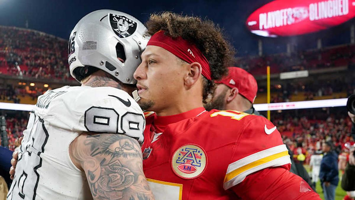  Nov 29, 2024; Kansas City, Missouri, USA; Kansas City Chiefs quarterback Patrick Mahomes (15) greets Las Vegas Raiders defensive end Maxx Crosby (98) after the game at GEHA Field at Arrowhead Stadium. Mandatory Credit: Denny Medley-Imagn Images | Denny Medley-Imagn Images 