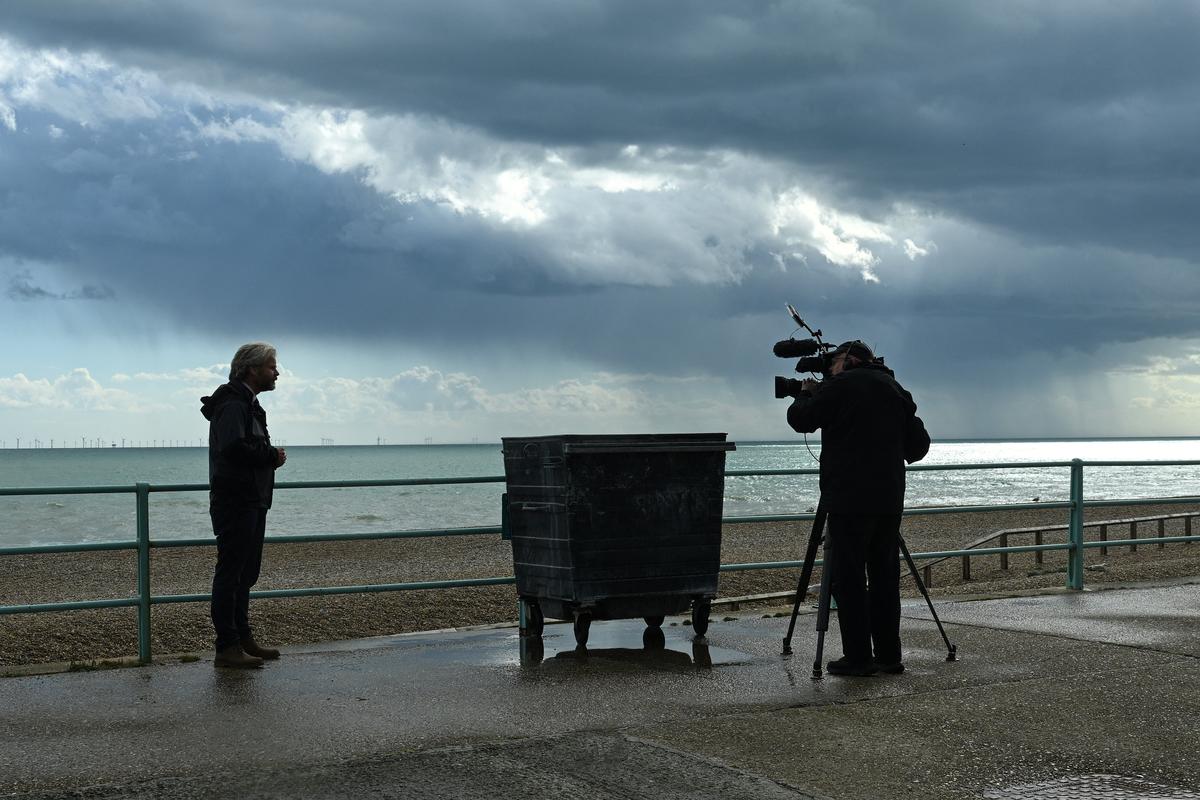 A media crew work near the scene where the bodies of three women were recovered from the sea early this morning Sussex Police said, in Brighton, East Sussex, Britain, May 13, 2026. REUTERS/Jaimi Joy