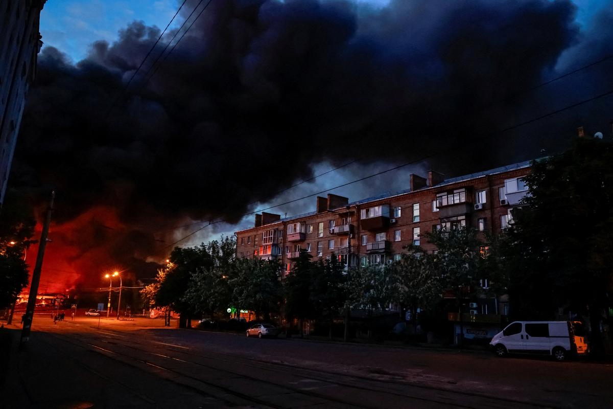 Fire and smoke rise at the site of a Russian missile and drone strike, amid Russia's attack on Ukraine, in Kyiv, Ukraine May 24, 2026. REUTERS/Stringer