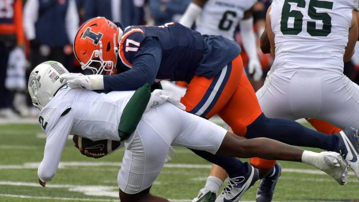  Nov 16, 2024; Champaign, Illinois, USA; Illinois Fighting Illini linebacker Gabe Jacas (17) sacks Michigan State Spartans quarterback Aidan Chiles (2) during the first half at Memorial Stadium. Mandatory Credit: Ron Johnson-Imagn Images | Ron Johnson-Imagn Images 