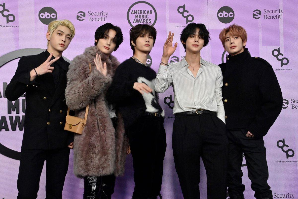 K-pop Tomorrow X Together, also known as TXT, arrives for the 50th annual American Music Awards at the Microsoft Theater in Los Angeles in 2022.