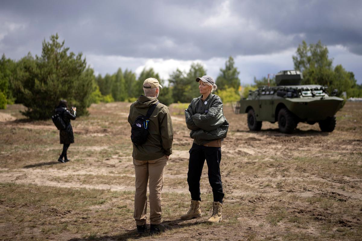Line Rindvig, CEO of the defence accelerator Defence Builder talks to a visitor, amid Russia's attack on Ukraine, in an unspecified location in Ukraine, May 30, 2026. REUTERS/Thomas Peter