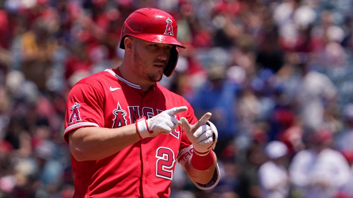 Los Angeles Angels’ Mike Trout gestures after hitting ground rule double during the first inning of a baseball game against the Oakland Athletics Sunday, May 22, 2022, in Anaheim, Calif. (AP Photo/Mark J. Terrill)