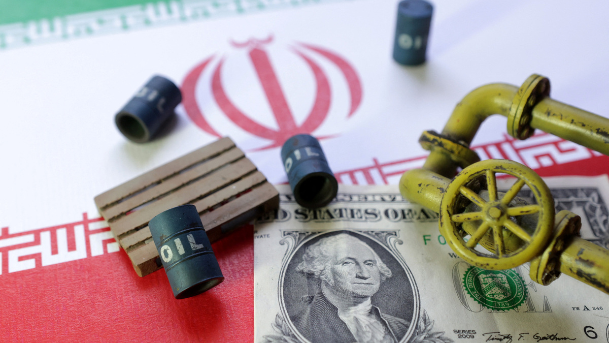 Iranian flag, a U.S dollar banknote and minatures of oil pipes and barrels are seen in this illustration taken June 23, 2025. REUTERS/Dado Ruvic/Illustration