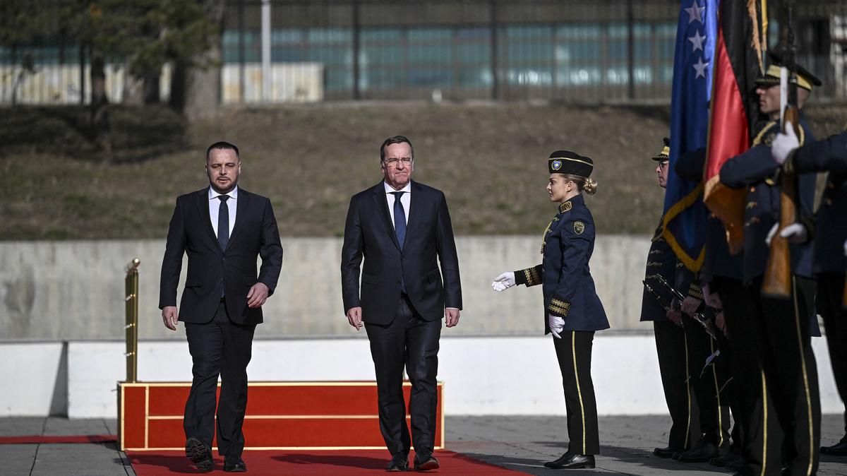 German Defence Minister Boris Pistorius (R) and Kosovan Defence Minister Ejup Maqedonci (L) review Kosovo's Security Force honour guard during his official visit to Kosovo, in Pristina, on Feb. 5, 2024. (Armend Nimani/AFP/Getty Images/TNS)