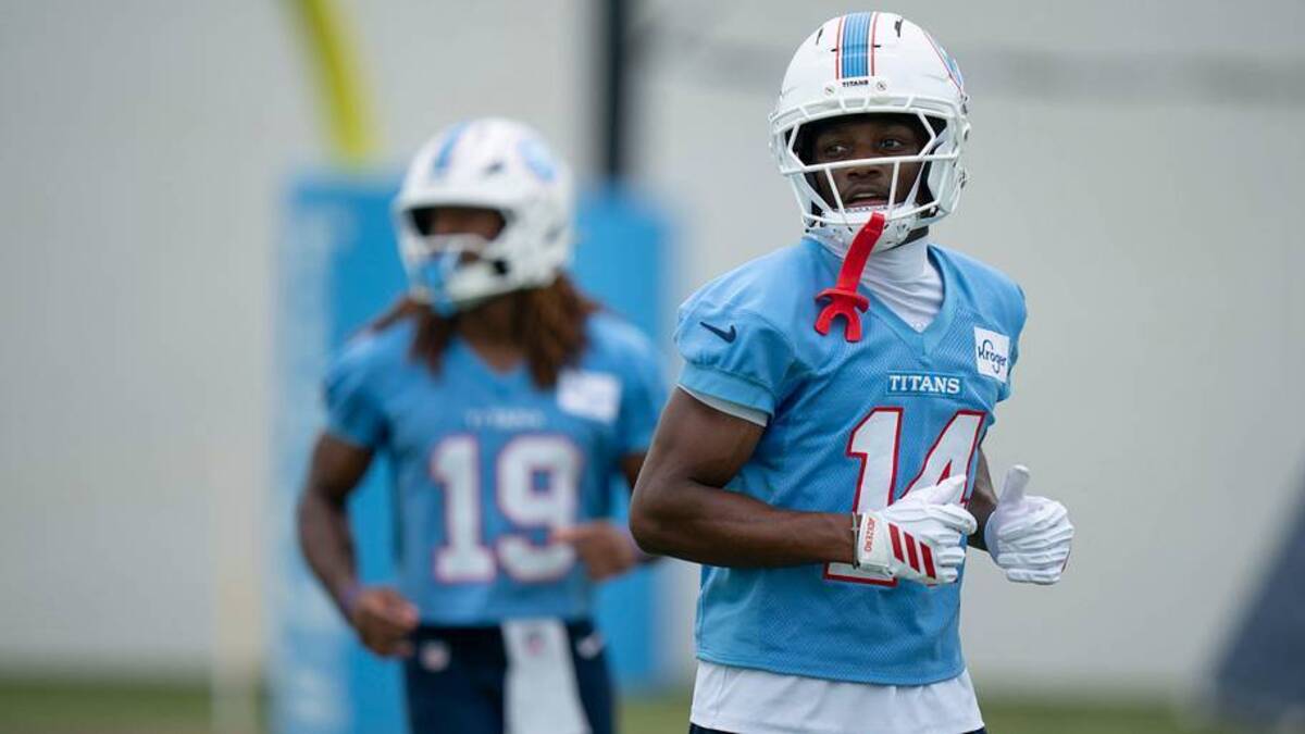  Tennessee Titans wide receivers Tyren Montgomery (19) and Carnell Tate (14) head back to the huddle during organized team activities | DENNY SIMMONS / THE TENNESSEAN / USA TODAY NETWORK via Imagn Images 