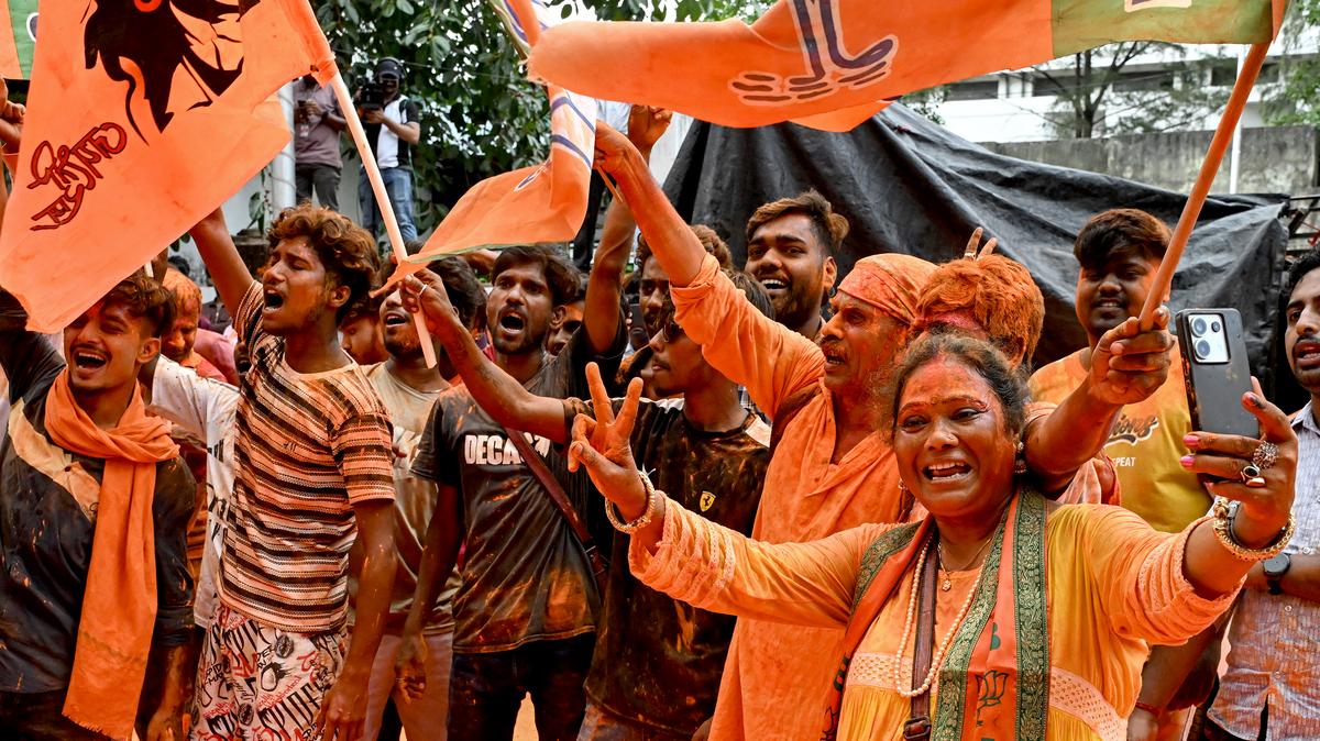 Bharatiya Janata Party (BJP) supporters celebrate after taking a lead during vote counting for the West Bengal Legislative Assembly elections, near the party head office in Kolkata on May 4, 2026. Vote counting in key Indian state elections was underway on May 4 under tight security, with the focus on West Bengal, where Prime Minister Narendra Modi's party appeared set for victory. (Dibyangshu Sarkar/AFP/Getty Images/TNS)