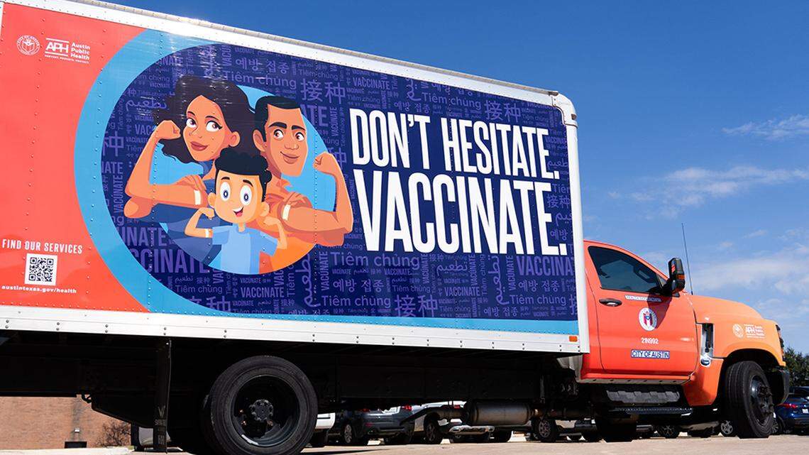 An Austin (Texas) Public Health truck is decorated with an advertisement encouraging vaccinations while parked outside the Austin Public Health office at the Bergstrom Technology Center on Friday. A measles outbreak in the state has sickened more than 150 people and left one child dead as of Monday.