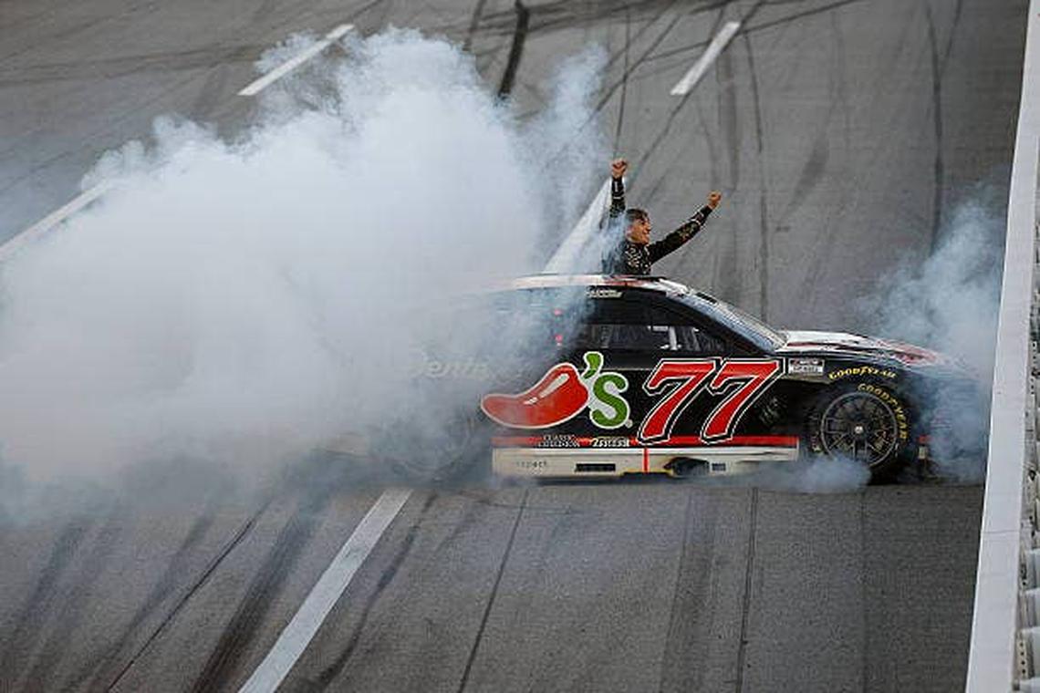  Carson Hocevar does a burnout against the wall after winning at Talladega. Photo by Sean Gardner/Getty Images
