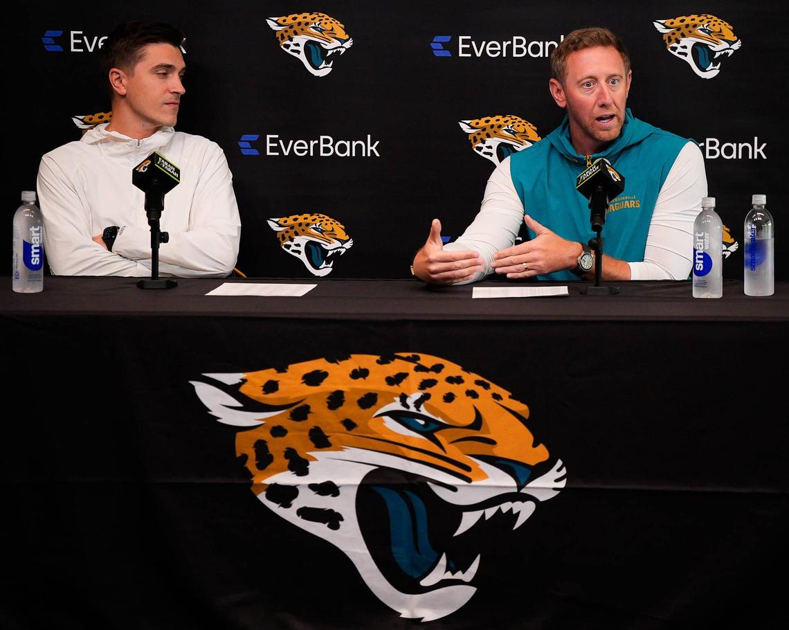  Jaguars General Manager James Gladstone, left listens as head coach Liam Coen 