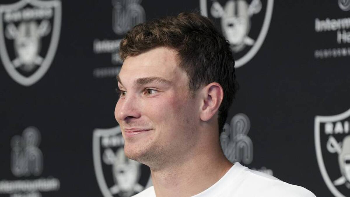  May 2, 2026; Henderson, NV, USA; Las Vegas Raiders quarterback Fernando Mendoza (15) speaks during a news conference at the team's Rookie Minicamp at Intermountain Health Performance Center. Mandatory Credit: Candice Ward-Imagn Images | Candice Ward-Imagn Images 