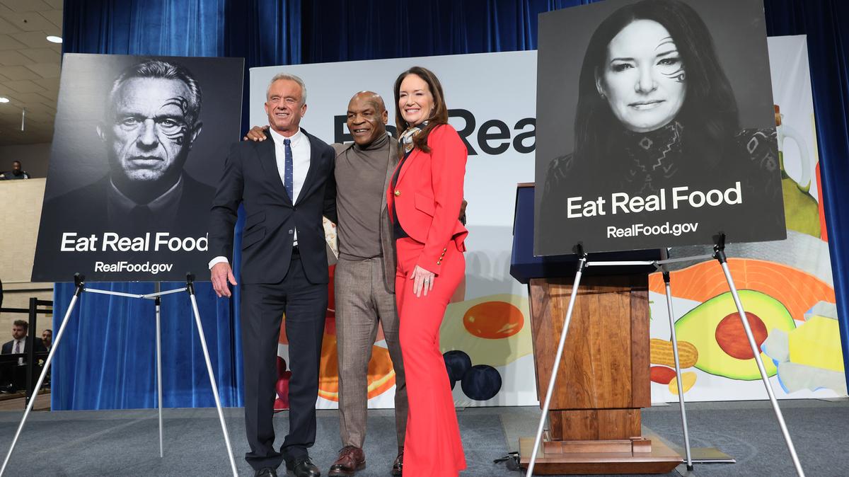 U.S. Secretary of Health and Human Services Robert F. Kennedy Jr. (left), former boxing heavyweight champion Mike Tyson (center), and Agriculture Secretary Brooke Rollins (right) take photos during an event to "Celebrate the Implementation of the Dietary Guidelines for Americans" at the Health and Human Services Headquarters on Feb. 11, 2026, in Washington, D.C. HHS Secretary RFK Jr. celebrated the updated guidelines and the Make America Healthy Again movement with Agriculture Secretary Brooke Rollins, former boxing heavyweight champion Mike Tyson, U.S. Chief Design Officer Joe Gebbia, American Medical Association President Bobby Mukkamala, Chef Andrew Gruel, Defense Department Undersecretary Mike Obadal and Bureau of Prisons Director William Marshall. (Michael M. Santiago/Getty Images/TNS)