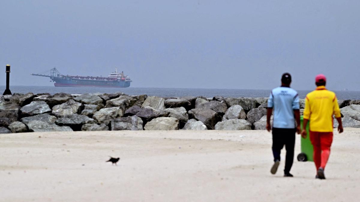 A ship is seen in the Persian Gulf off the coast of Sharjah the day after the failure of U.S.-Iran peace talks on April 13, 2026. (AFP/Getty Images/TNS)