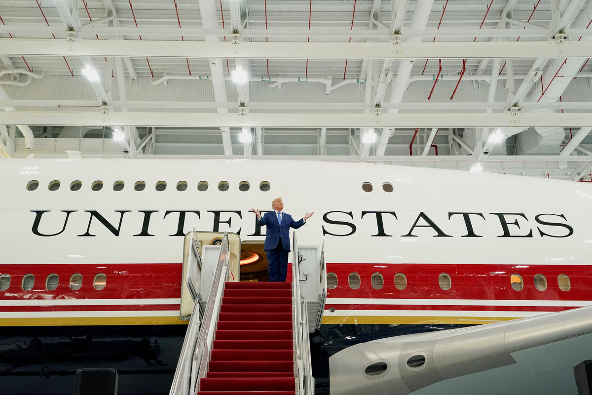 U.S. President Donald Trump gestures as he tours the VC-25B aircraft gifted by Qatar that will be used as Air Force One, at Joint Base Andrews, Maryland, U.S., June 19, 2026. REUTERS/Elizabeth Frantz