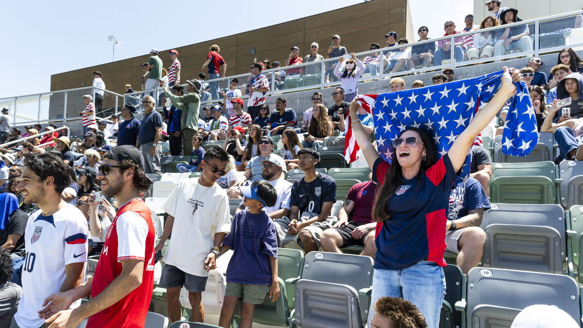 Martha Gray, right, cheers for the U.S. Men’s National Team as they practice on Monday, June 8, 2026 in Irvine at the Great Park Championship Soccer Stadium in preperation for the 2026 FIFA World Cup. The 2026 FIFA World Cup will take place from June 11 to July 19 across the United States, Canada, and Mexico. (Photo by Paul Bersebach, Orange County Register/SCNG)
