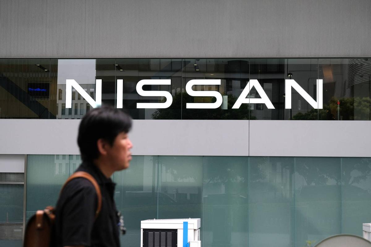  The logo of Japan's automaker Nissan Motor Corporation is displayed at an entrance of the company's global headquarters in Yokohama, Kanagawa Prefecture on June 24, 2025. (Photo by Kazuhiro NOGI / AFP) (Photo by KAZUHIRO NOGI/AFP via Getty Images) Getty Images