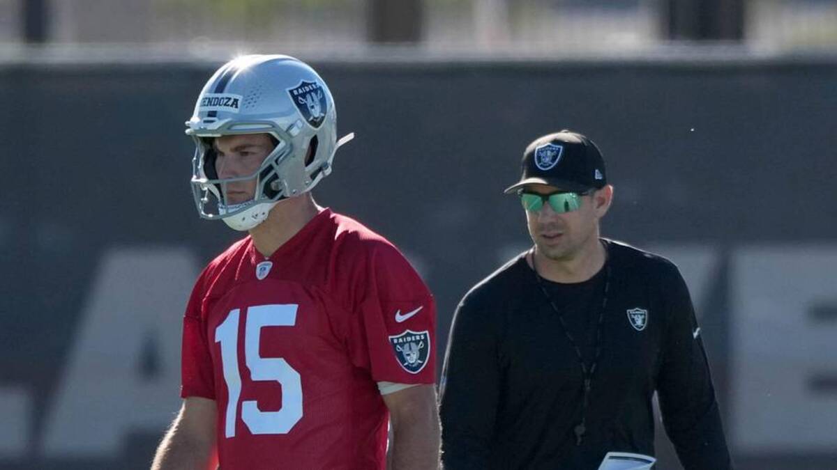  Jun 9, 2026; Henderson, NV, USA; Las Vegas Raiders quarterback Fernando Mendoza (15) and coach Klint Kubiak during minicamp at Intermountain Health Performance Center. Mandatory Credit: Kirby Lee-Imagn Images | Kirby Lee-Imagn Images 