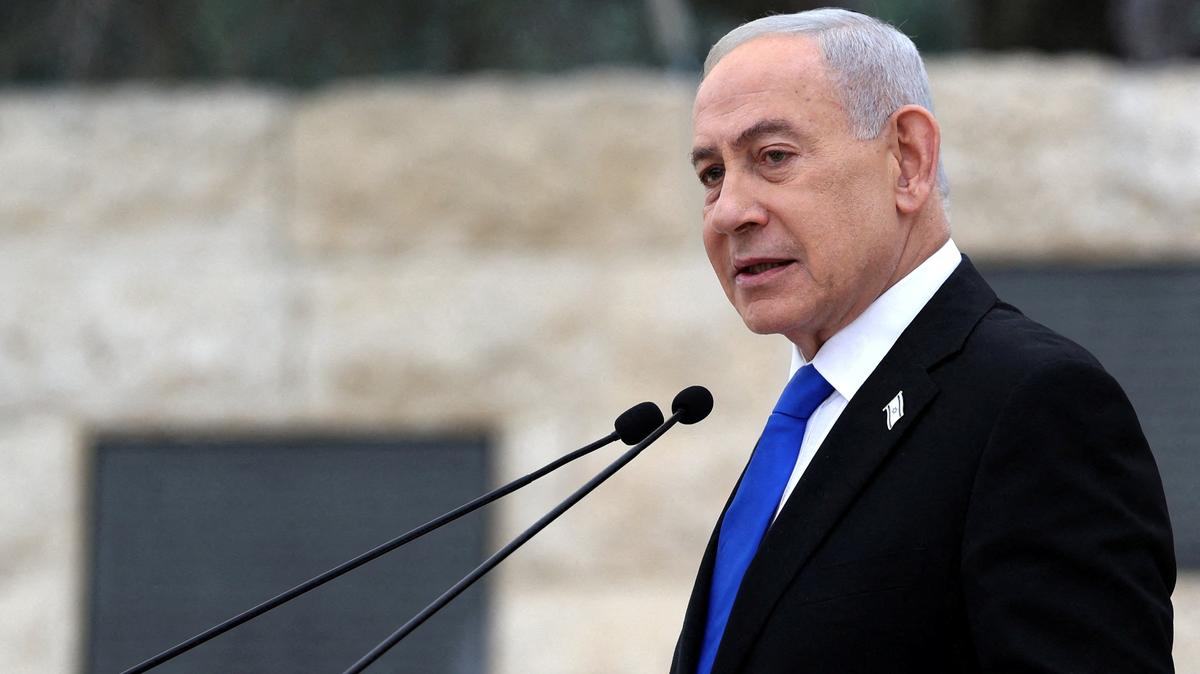 FILE PHOTO: Israel’s Prime Minister Benjamin Netanyahu speaks during a ceremony commemorating Israel’s Remembrance Day for fallen soldiers, or Yom HaZikaron, at the Military Cemetery on Mount Herzl in Jerusalem April 21, 2026. ILIA YEFIMOVICH/Pool via REUTERS/File Photo
