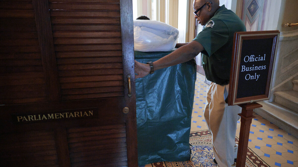 A folding cot is rolled into the Senate parliamentarian's office at the U.S. Capitol on June 3, 2026, in Washington, D.C., as the U.S. Senate is preparing for an extending series of amendment votes, also called a "vote-a-rama." (Chip Somodevilla/Getty Images/TNS)