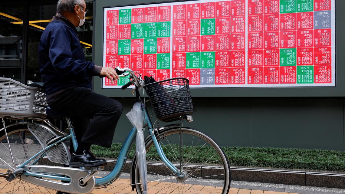 Asian stocks hit record high, dollar wobbles on peace deal hopes 