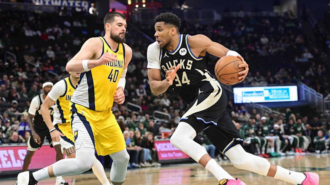  Mar 15, 2026; Milwaukee, Wisconsin, USA; Milwaukee Bucks forward Giannis Antetokounmpo (34) drives for the basket against Indiana Pacers center Ivica Zubac (40) in the second quarter at Fiserv Forum. Mandatory Credit: Benny Sieu-Imagn Images | Benny Sieu-Imagn Images 