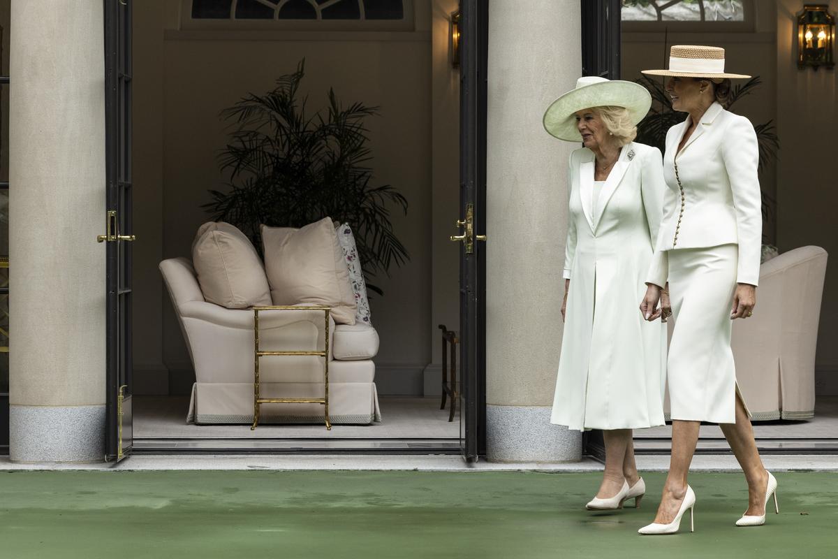 First lady Melania Trump, right, and Queen Camilla arrive for an event on "exploring U.S.-U.K. History through Innovation" at the White House Tennis Pavilion at the White House campus in Washington, on Tuesday, April 28, 2026. (Anna Rose Layden/The New York Times)