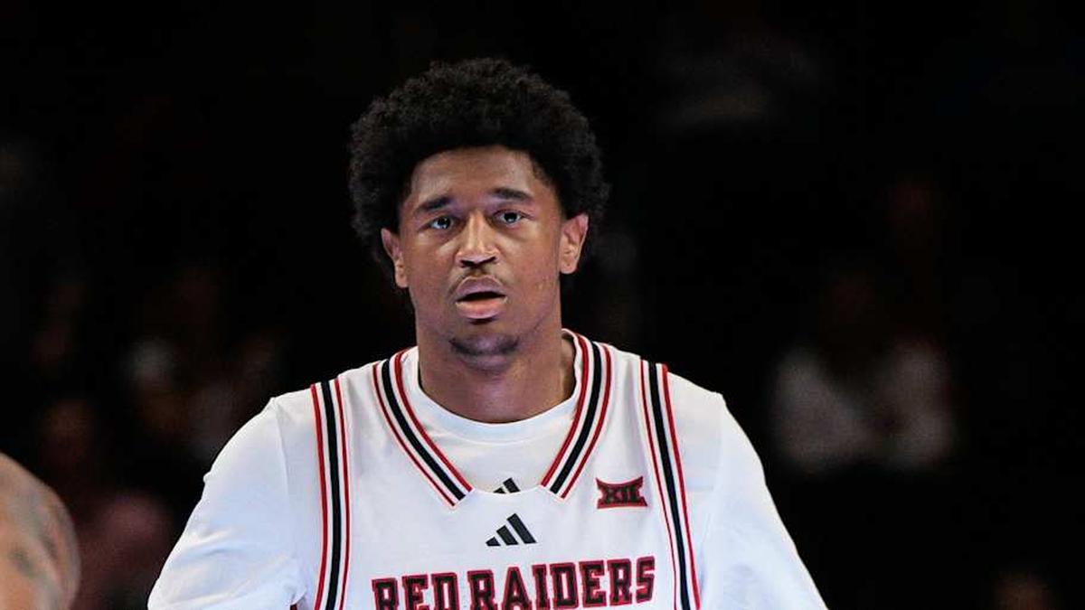  Mar 12, 2026; Kansas City, MO, USA; Texas Tech Red Raiders guard Jaylen Petty (11) brings the ball up court around Iowa State Cyclones guard Jamarion Batemon (1) during the first half at T-Mobile Center. Mandatory Credit: William Purnell-Imagn Images | William Purnell-Imagn Images 