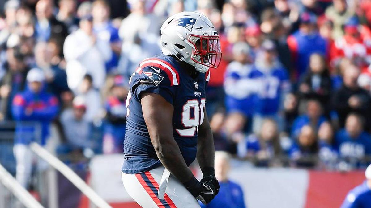  Oct 22, 2023; Foxborough, Massachusetts, USA; New England Patriots defensive tackle Christian Barmore (90) reacts after a sack during the first half against the Buffalo Bills at Gillette Stadium. Mandatory Credit: Bob DeChiara-Imagn Images | Bob DeChiara-Imagn Images 