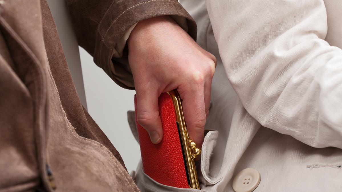 Carry the absolute minimum of things in your purse and keep the purse close, wearing it cross-body to help prevent theft. (Dreamstime/TNS)