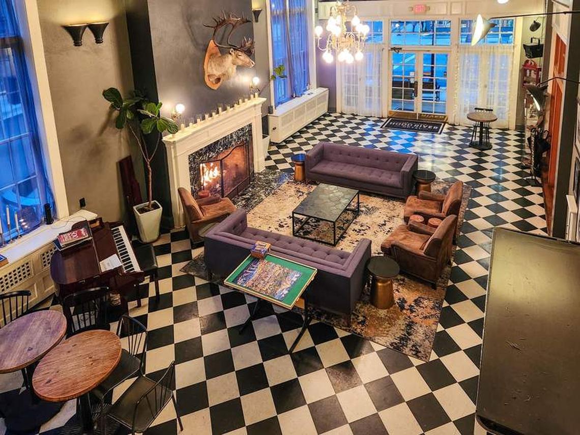  Guests can enjoy the cozy fireplace and games in the historic Hood River Hotel lobby. Photo credit: June Russell-Chamberlin 