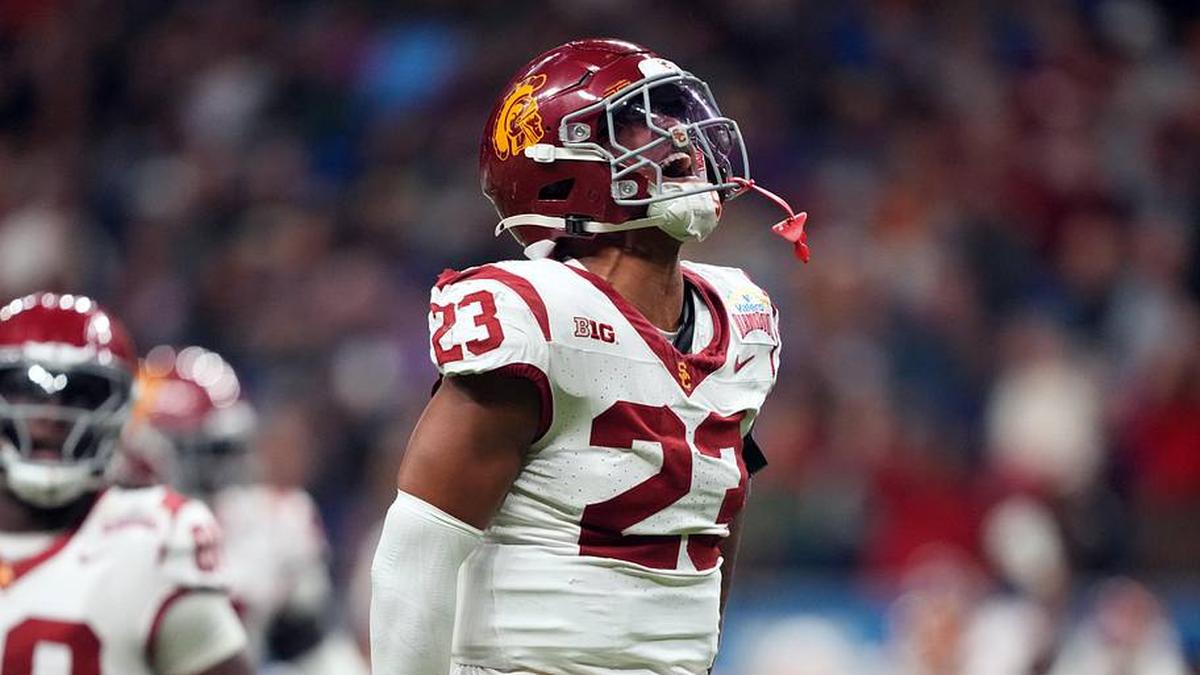  Dec 30, 2025; San Antonio, TX, USA; Southern California Trojans linebacker Desman Stephens II (23) celebrates against the TCU Horned Frogs in the second half during the Alamo Bowl at Alamodome. Mandatory Credit: Kirby Lee-Imagn Images | Kirby Lee-Imagn Images 