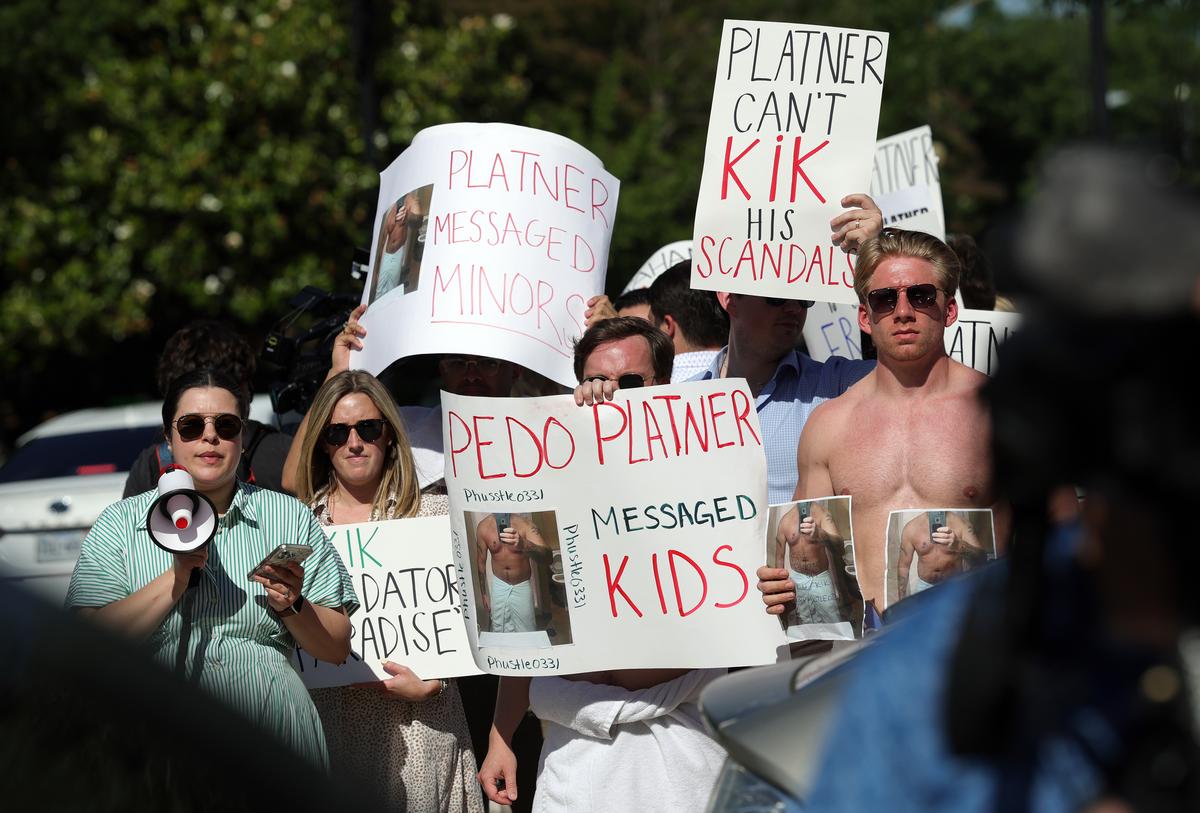  Demonstrators protest outside the Democratic Senatorial Campaign Committee as Maine U.S. Senate candidate Graham Platner meets with Senators, on June 02, 2026, in Washington, D.C. Platner is meeting with Democratic Senators after allegations surfaced that he sent sexually explicit text messages to multiple women. (Photo by Kevin Dietsch/Getty Images) 