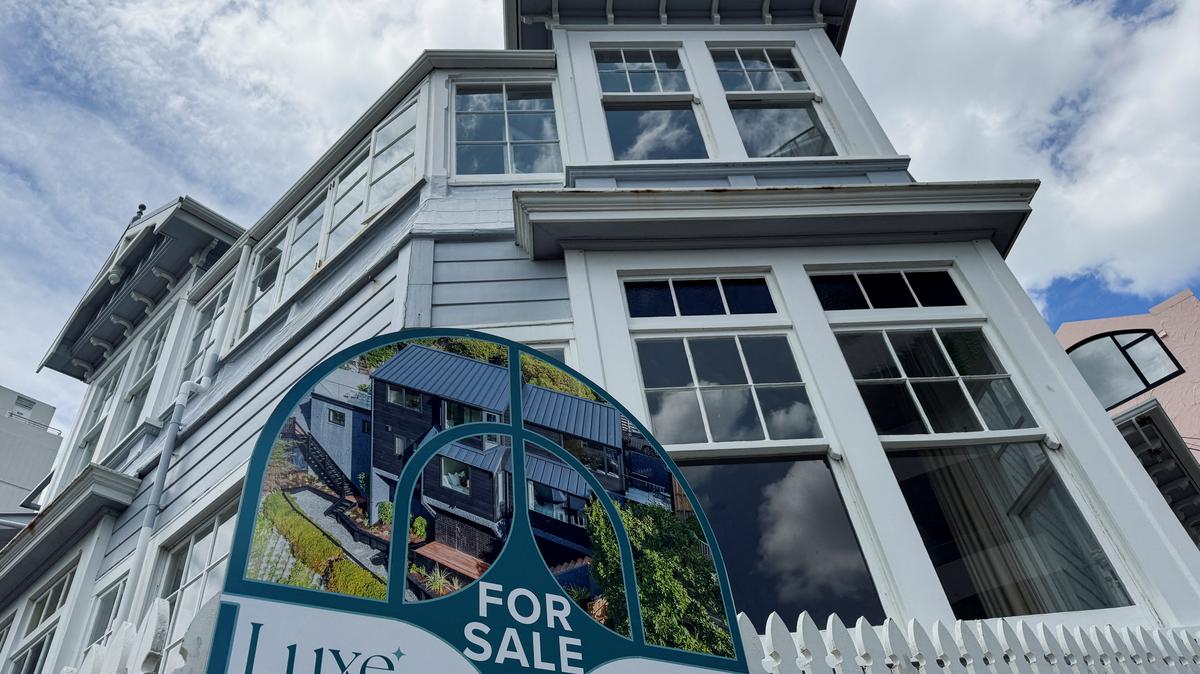A real estate "for sale" sign is displayed, in Oriental Bay, Wellington, New Zealand November 25, 2025. REUTERS/Lucy Craymer
