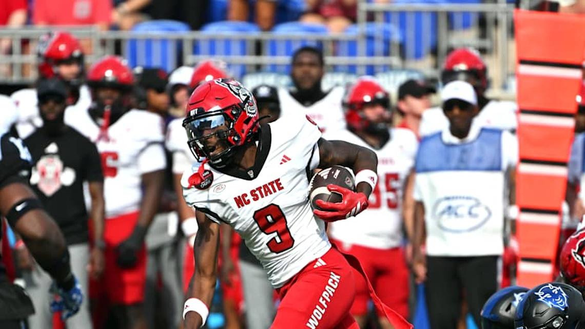  Sep 20, 2025; Durham, North Carolina, USA; North Carolina State Wolfpack wide receiver Terrell Anderson (9) runs the ball past Duke Blue Devils saftey DaShawn Stone (8) during the first quarter at Wallace Wade Stadium. Mandatory Credit: Zachary Taft-Imagn Images | Zachary Taft-Imagn Images 