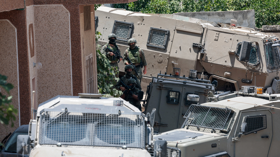 Israeli troops round up Palestinians in West Bank village after shootout involving settlers 