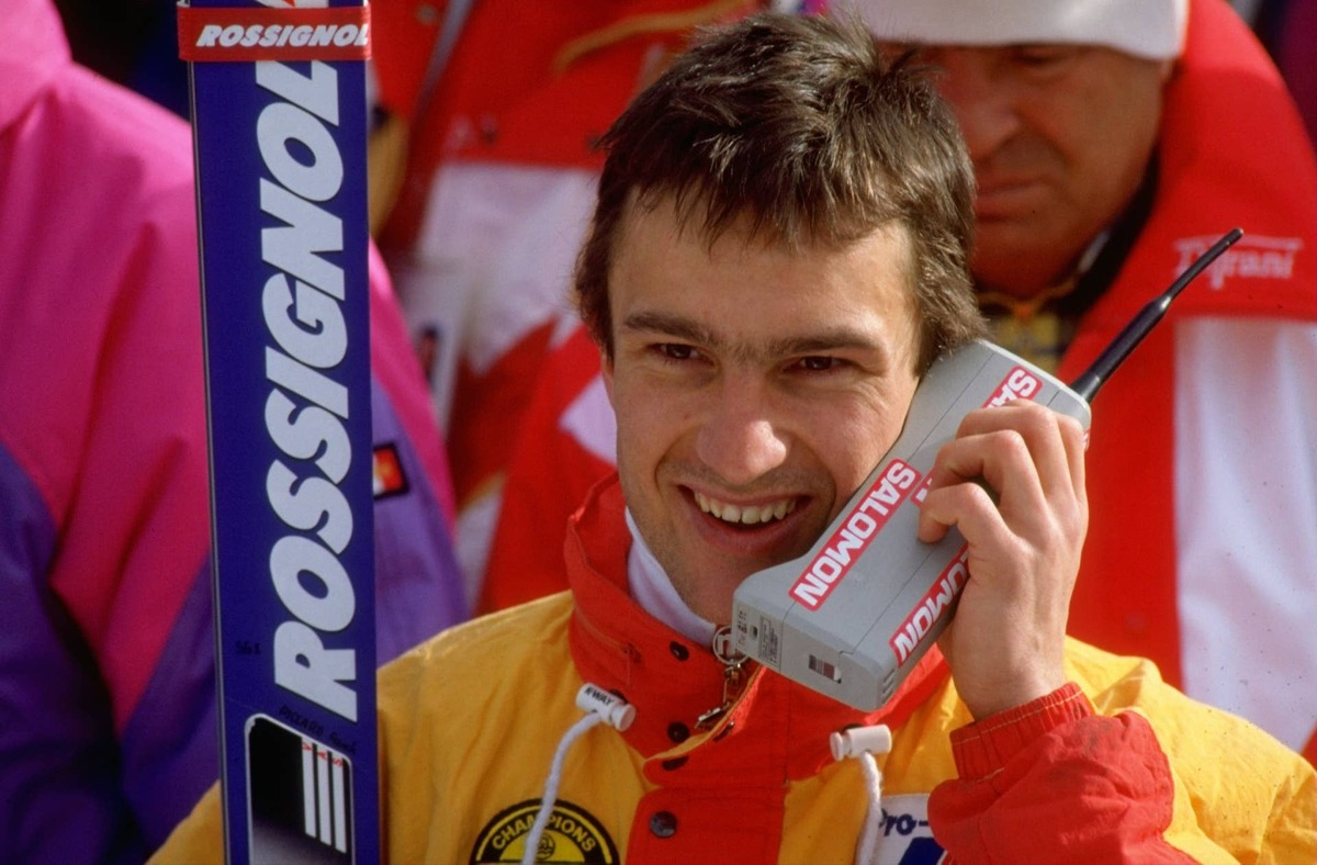  Franck Piccard of France talks on his mobile phone after the Men's Super G Slalom event at the 1988 Winter Olympic Games in Calgary, Canada.