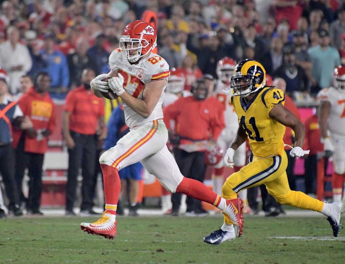  Kansas City Chiefs tight end Travis Kelce eludes Los Angeles Rams defensive back Marqui Christian during the first half at the Los Angeles Memorial Coliseum in 2018. Mandatory Credit: Kirby Lee-USA TODAY Sports