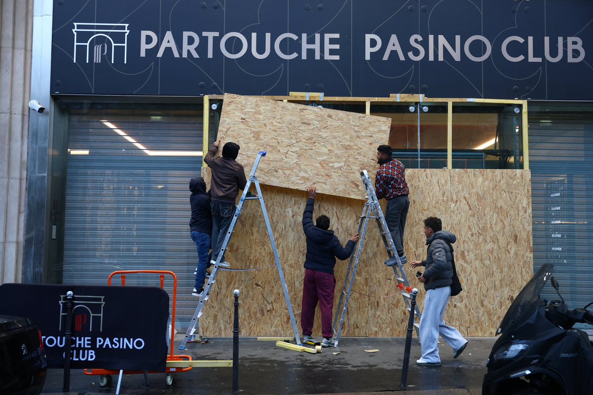 France's luxury stores board up windows ahead of fresh protests ...