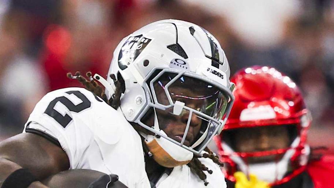  Dec 21, 2025; Houston, Texas, USA; Las Vegas Raiders running back Ashton Jeanty (2) rushes against the Houston Texans during the first quarter at NRG Stadium. Mandatory Credit: Thomas Shea-Imagn Images | Thomas Shea-Imagn Images 