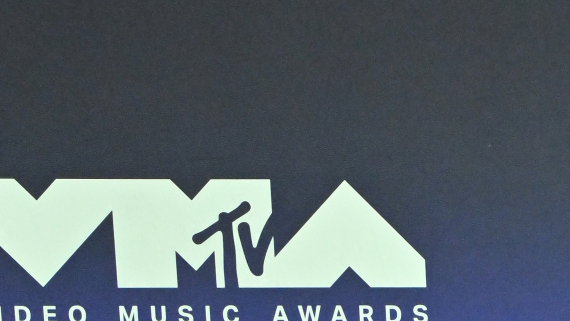 Adam Lambert Brings the Drama to 2026 MTV VMAs Red Carpet With Black Cape 