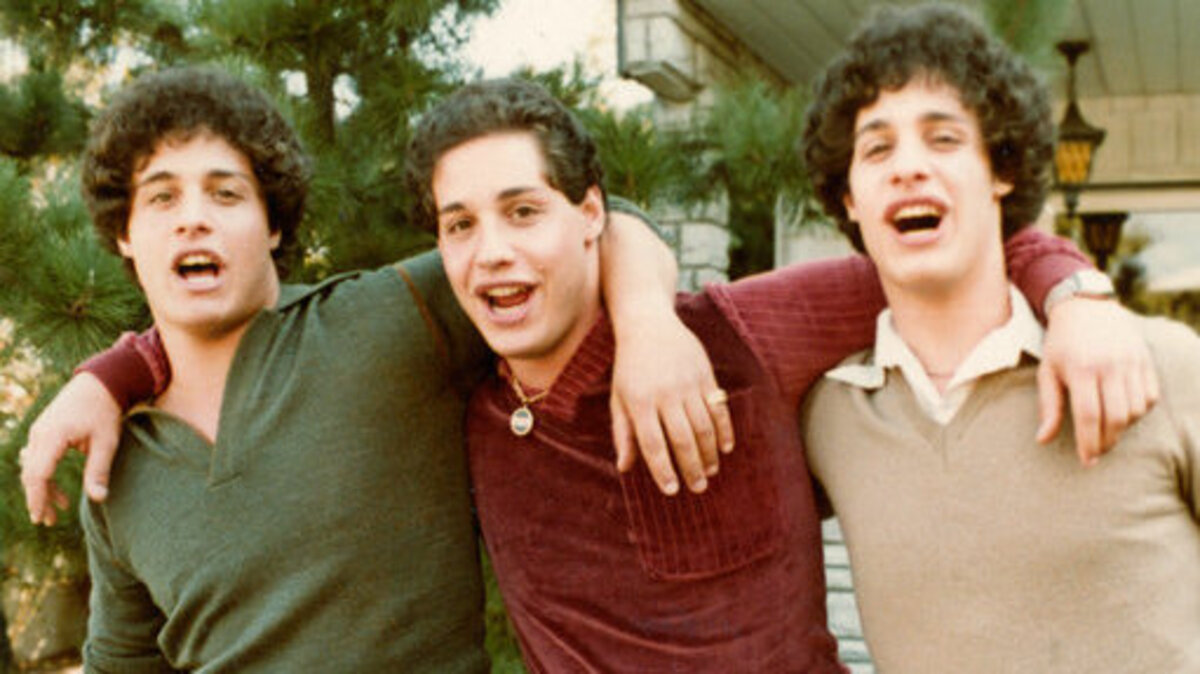 This undated photo provided by film studio NEON shows Eddy Galland, from left, David Kellman and Bobby Shafran, three brothers who learned at age 19 that they had been separated at birth. The story of the three identical triplets is the subject of the film “Three Identical Strangers,” which opens in theaters on Friday, June 29, 2018. The film shows not only their joyous first meeting, but also the dark backstory that led to their separation.