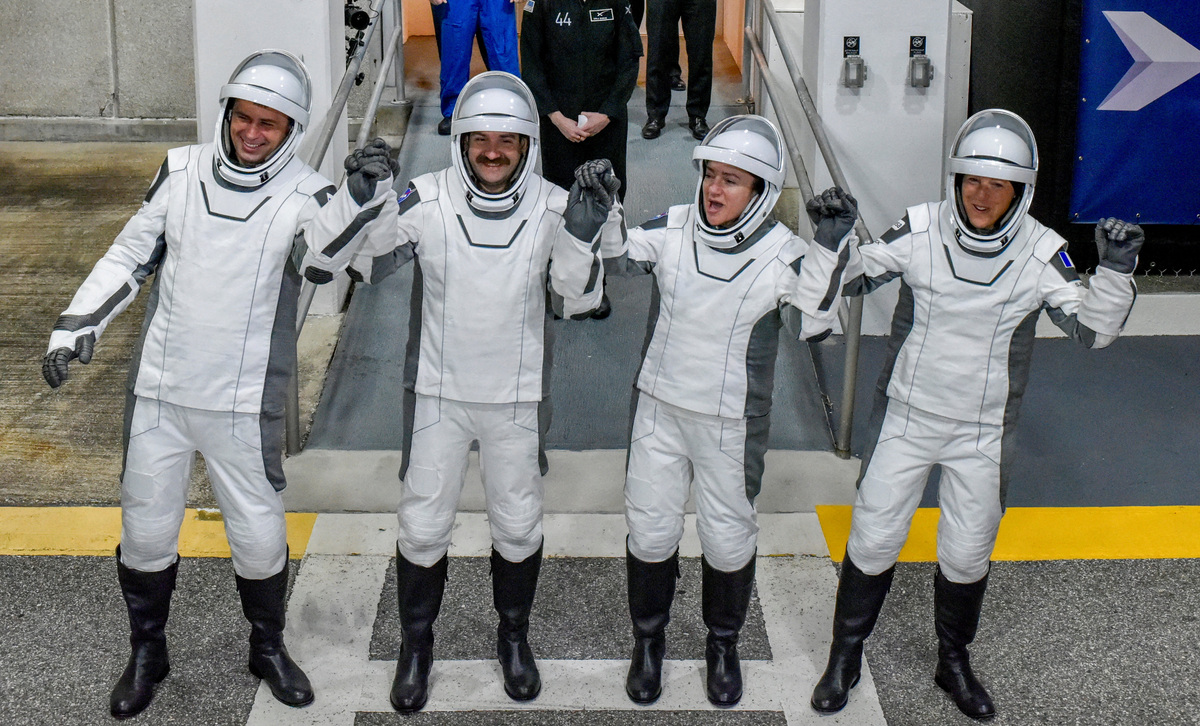 FILE PHOTO: NASA’s Crew-12 members, Russian cosmonaut Andrey Fedyaev, NASA astronauts Jack Hathaway, Jessica Meir, and ESA astronaut Sophie Adenot walk out of the Operations & Checkout Building at the Kennedy Space Center before transport to Launch Complex 40, ahead of their launch to the International Space Station, in Cape Canaveral, Florida, U.S., February 13, 2026. REUTERS/Steve Nesius/File Photo