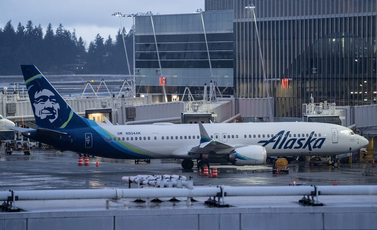 An Alaska Airlines Boeing 737 MAX 9 plane sits at a gate at Seattle-Tacoma International Airport on Jan. 6, 2024.