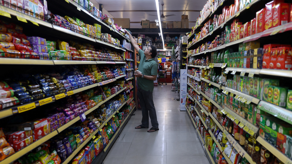 A customer picks a product from a rack at a supermarket in Bengaluru, India, June 3, 2026. REUTERS/Priyanshu Singh