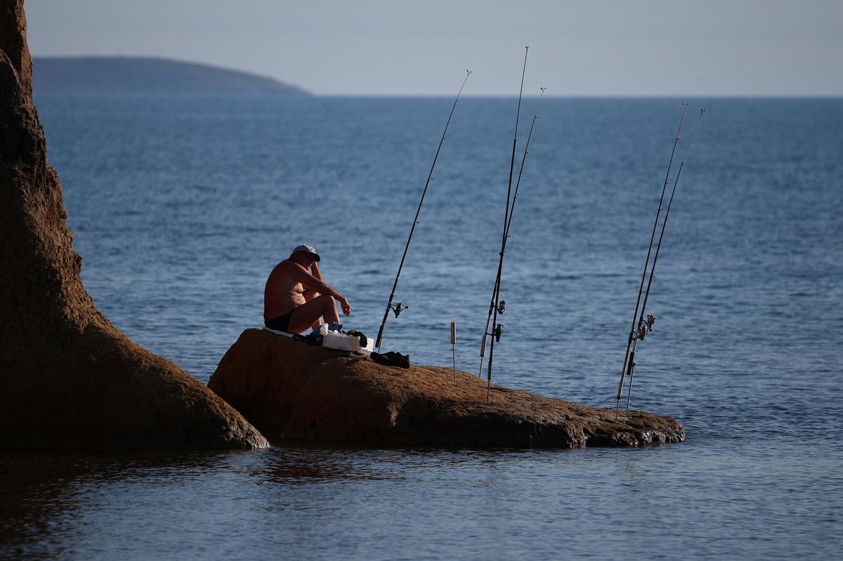 A fisherman is seen in the Vjosa-Narte protected area where a luxury resort is planned by a company linked with Donald Trump's son-in-law Jared Kushner, near Vlora, Albania, May 31, 2026. REUTERS/Florion Goga