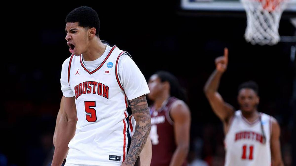  Houston's Chris Cenac Jr. (5) cheers during a second-round game in the NCAA men's basketball tournament between Houston Cougars and Texas A&M Aggies at Paycom Center in Oklahoma City, Saturday March 21, 2026. | SARAH PHIPPS/THE OKLAHOMAN / USA TODAY NETWORK via Imagn Images 